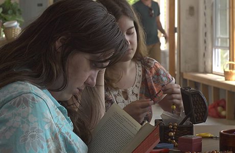 A woman reading a book.