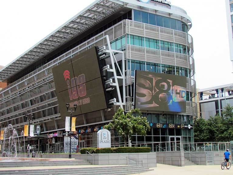 A large building with a large screen.