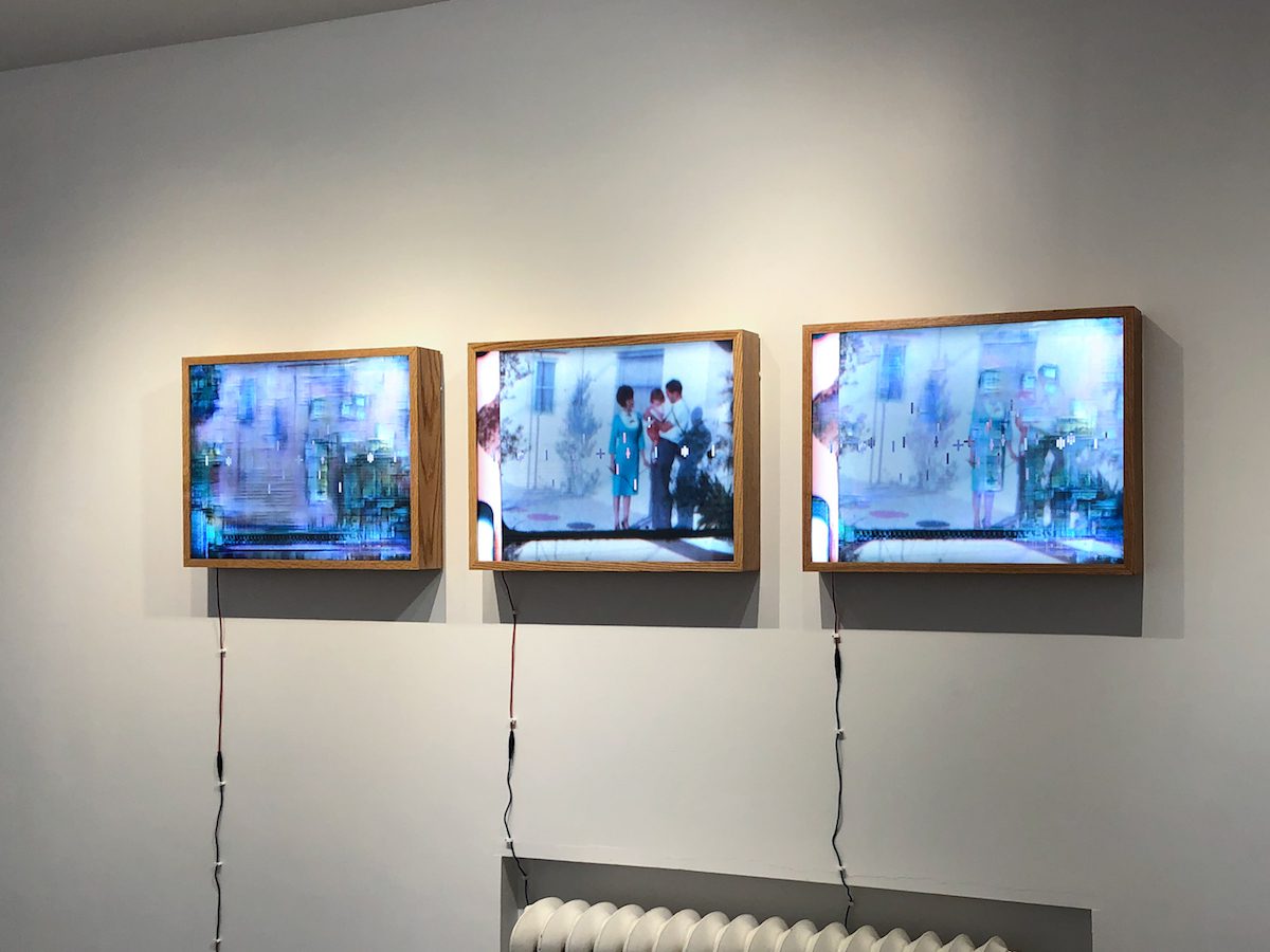 3 light boxes titled Family Reunion